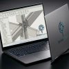 PrimeSpecs Core Vista business laptop with a full-size keyboard and professional dark grey finish.